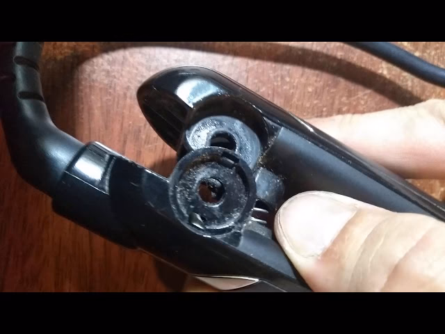 ¿Cómo abrir una plancha de pelo Remington?