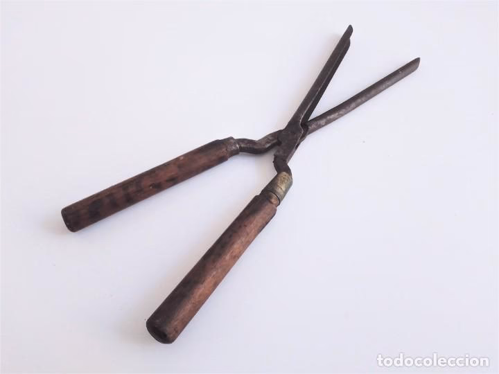 ¿Quién invento el primer rizador de cabello?