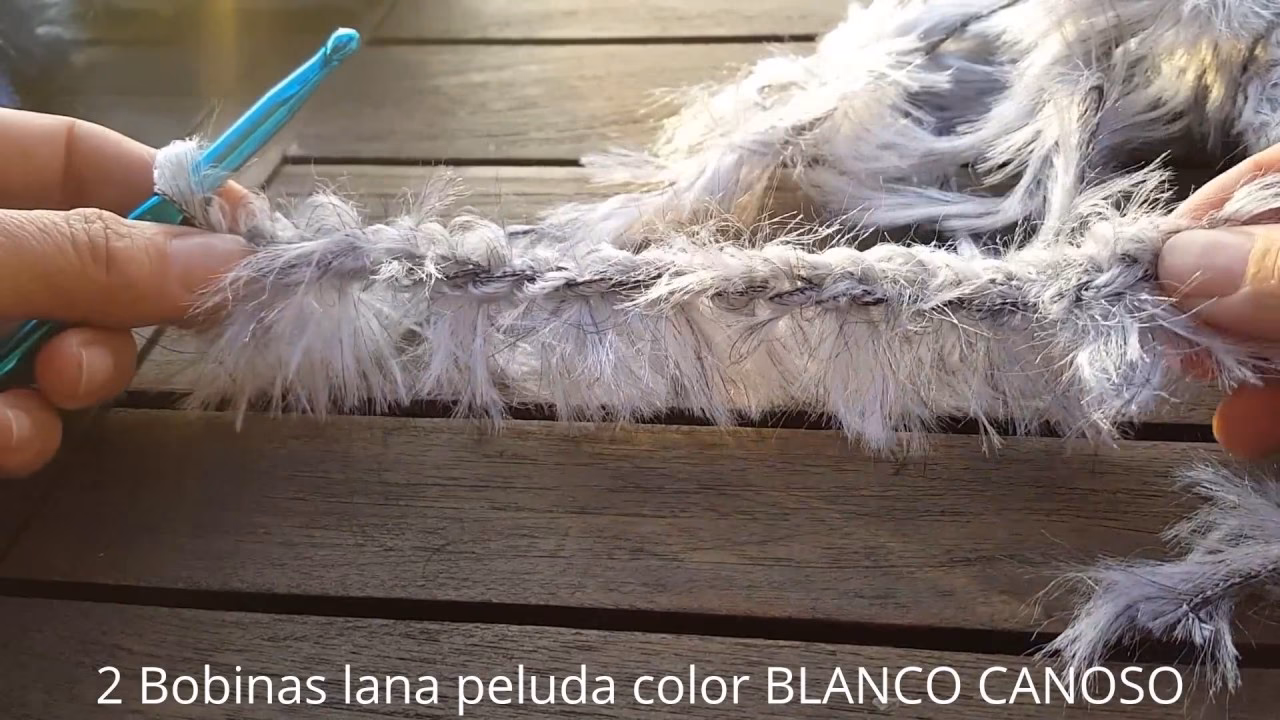 ¿Cómo ponerse una bufanda con flecos?